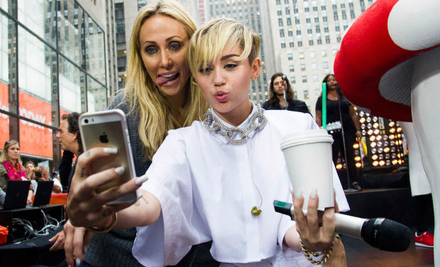 Twerking 'expert' Miley Cyrus takes a selfie with her mother Tish Cyrus - AP/File Twerking 'expert' Miley Cyrus takes a selfie with her mother Tish Cyrus - AP/File